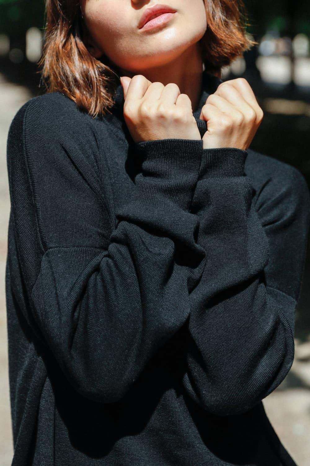 Pull col roule en laine merinos noir pour femme